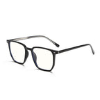 45-degree perspective of the over-sized black TR90 frame showing the sleek temple design.